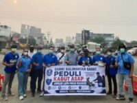 Kader GAMKI Kalbar Turun Jalan, Bagikan Masker untuk Warga